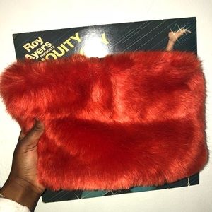 ORANGE FUR CARRY Clutch